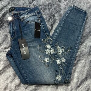 Bebe Blue Skinny Jeans with Distressed Details